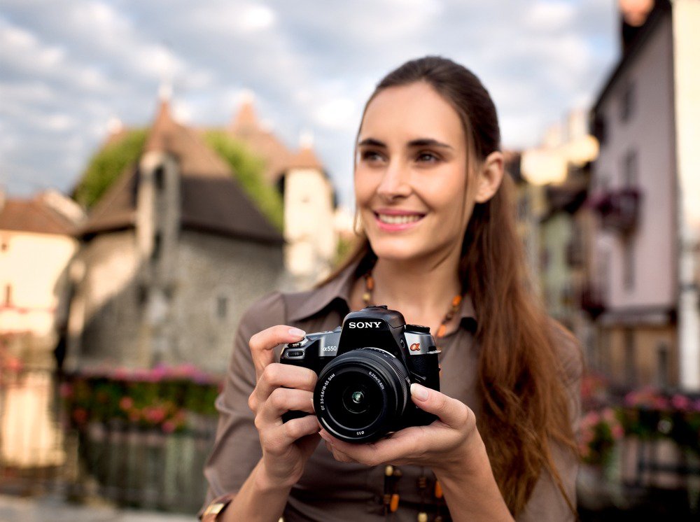 Creator holding camera, generating content